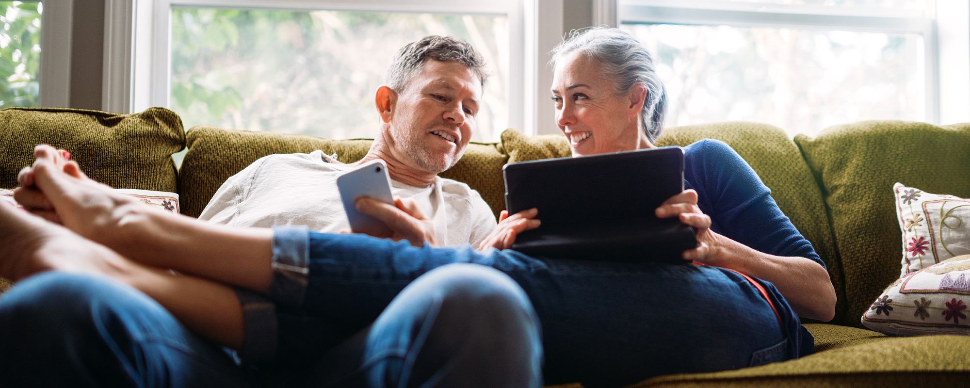 Couple sat on a sofa